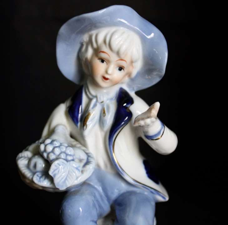 Little Boy Blue with Fruit Basket Porcelain Figurine