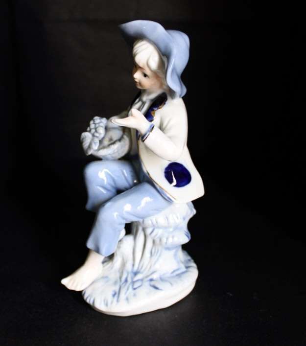 Little Boy Blue with Fruit Basket Porcelain Figurine