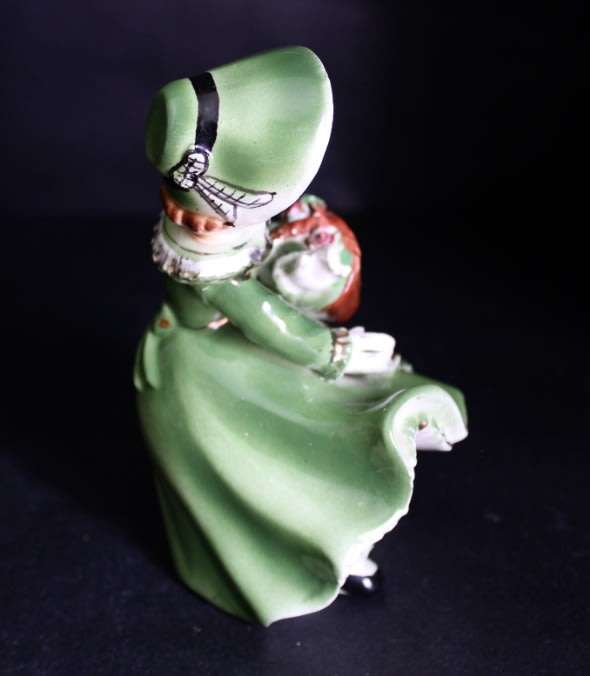 Girl in Green with Flower Basket Figurine.