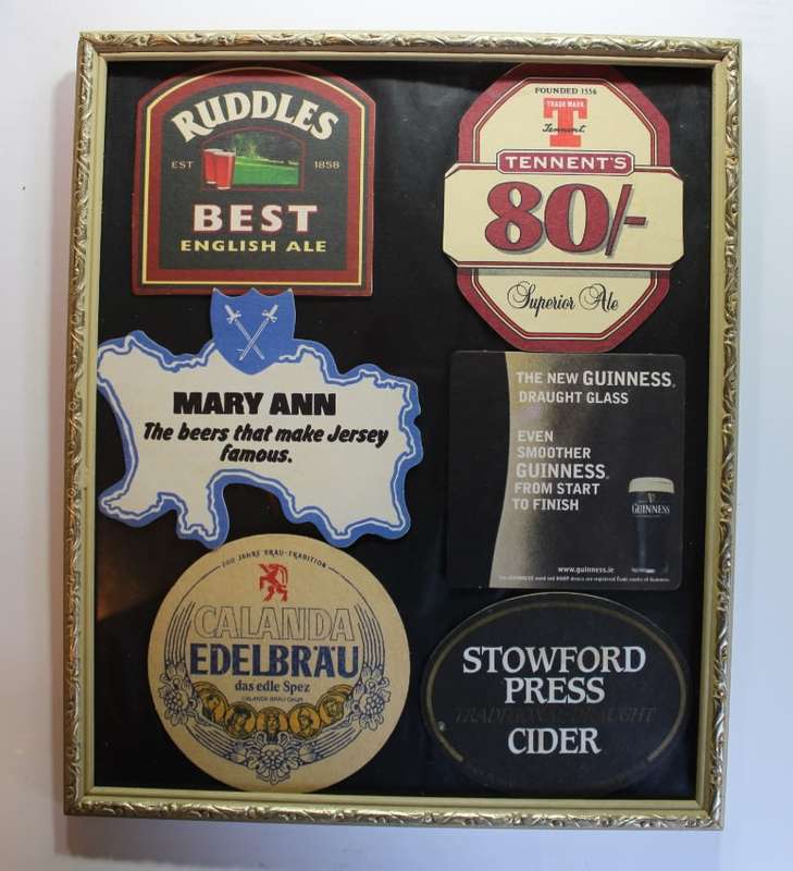 Assorted International Bar Mats Framed.