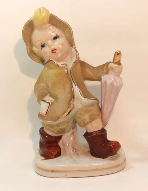 Charming Little Boy and Girl in Hooded Jackets Porcelain Figurines.