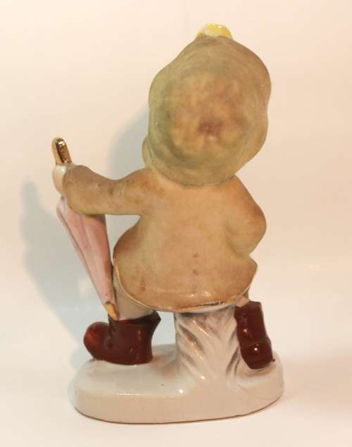 Charming Little Boy and Girl in Hooded Jackets Porcelain Figurines.