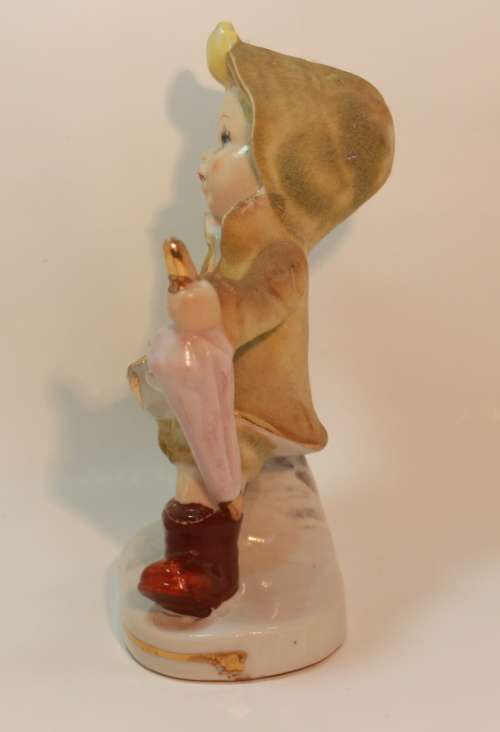 Charming Little Boy and Girl in Hooded Jackets Porcelain Figurines.