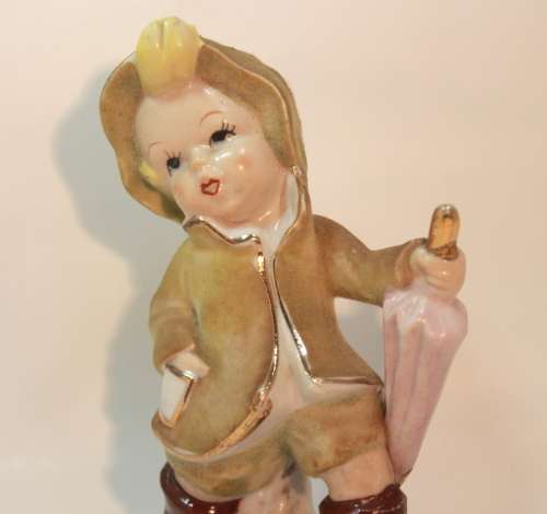 Charming Little Boy and Girl in Hooded Jackets Porcelain Figurines.