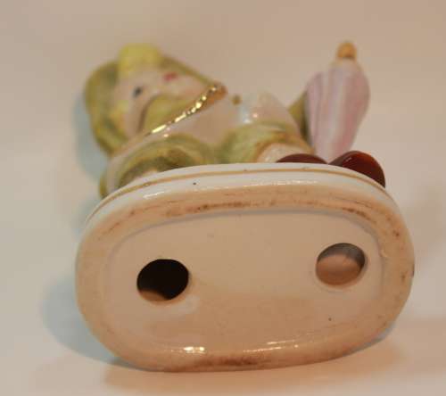 Charming Little Boy and Girl in Hooded Jackets Porcelain Figurines.