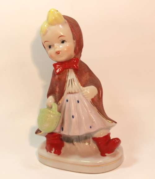 Charming Little Boy and Girl in Hooded Jackets Porcelain Figurines.