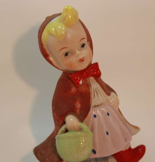 Charming Little Boy and Girl in Hooded Jackets Porcelain Figurines.
