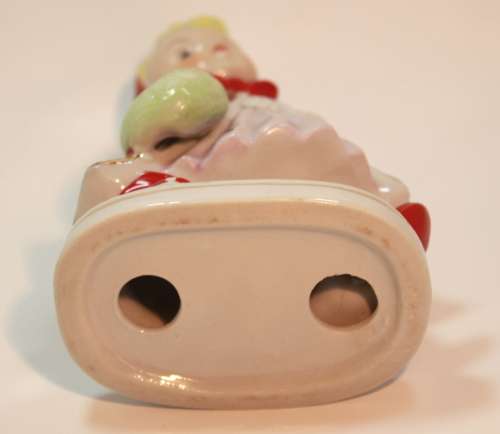 Charming Little Boy and Girl in Hooded Jackets Porcelain Figurines.