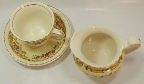 Vintage Small Creamer with Teacup and Saucer for Decorative Display