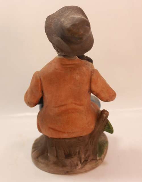 Vintage Porcelain Figurine of Old Man with Tobacco Pouch and Pipe