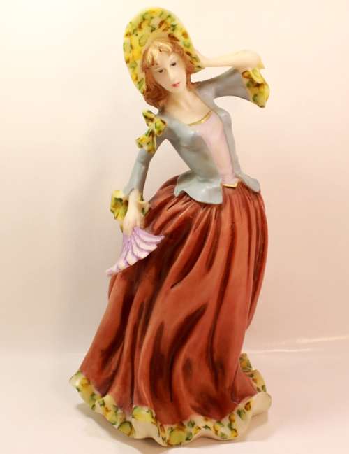 Statuesque Lady with Bonnet and Fan Figurine