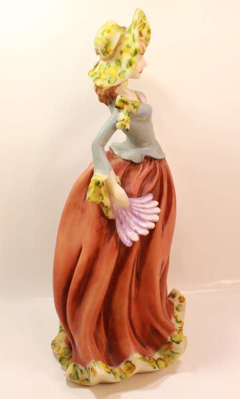 Statuesque Lady with Bonnet and Fan Figurine