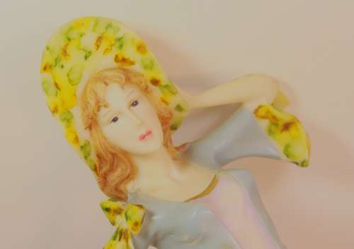 Statuesque Lady with Bonnet and Fan Figurine