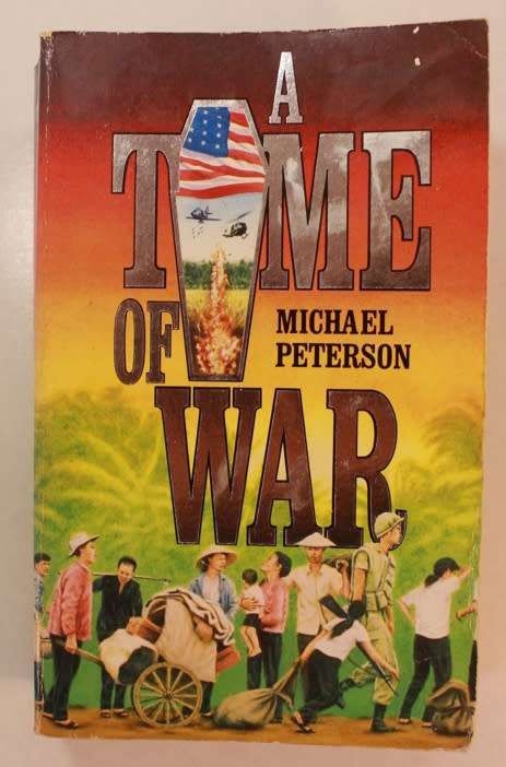 A Time Of War by Michael Peterson Softcover Book