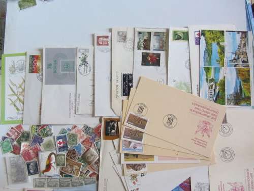 MIXED WORLD LOT WITH FDC'S,STAMPS,DSC'SAND ODDS & ENDS