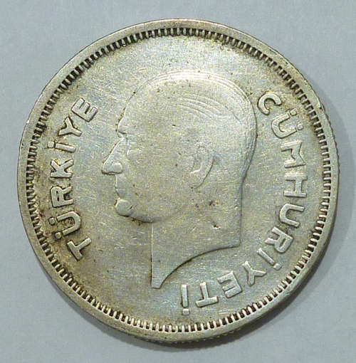 Turkey 1 Lira 1939 / VF+/XF- / Silver .830 / KM#866 / 11,97 grams / 29 mm / mintage 376.000. Scarce.