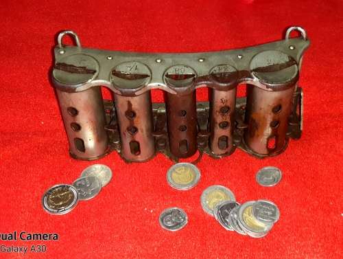 VINTAGE TRAM CONDUCTORS COIN DISPENSOR.