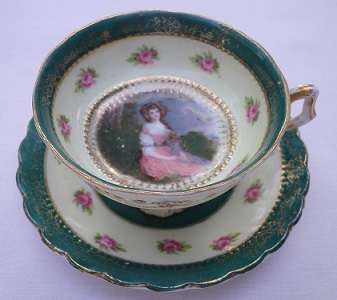Cutest hand-painted miniature TEA cup & saucer. "OLD ENGLISH MASTERS" serieS