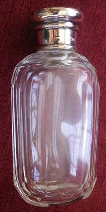 Hallmarked Sterling Silver lidded Vintage panel cut glass cologne/perfume travelling bottle. London