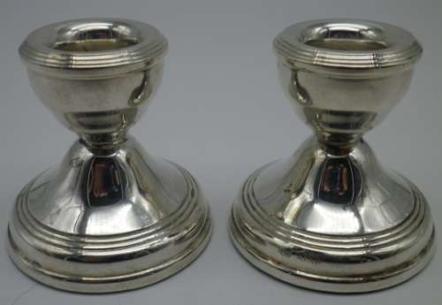 Hallmarked silver candle sticks B/ham 1969. WH Broadway & company 209 grms 5.5cm high