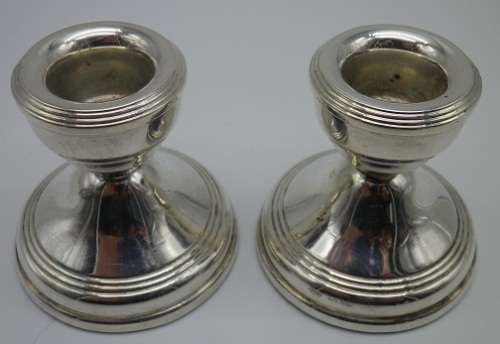 Hallmarked silver candle sticks B/ham 1969. WH Broadway & company 209 grms 5.5cm high
