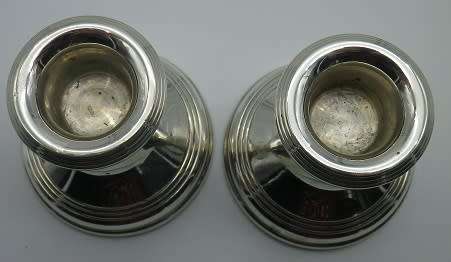 Hallmarked silver candle sticks B/ham 1969. WH Broadway & company 209 grms 5.5cm high