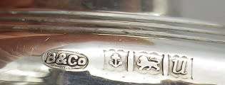 Hallmarked silver candle sticks B/ham 1969. WH Broadway & company 209 grms 5.5cm high