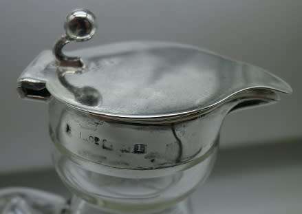 Whisky Noggin with hallmarked silver lid and label. HB Johnson and Company, B/ham 1910. 11cm