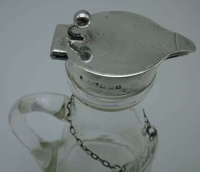 Whisky Noggin with hallmarked silver lid and label. HB Johnson and Company, B/ham 1910. 11cm