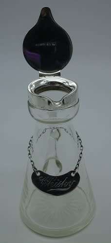 Whisky Noggin with hallmarked silver lid and label. HB Johnson and Company, B/ham 1910. 11cm
