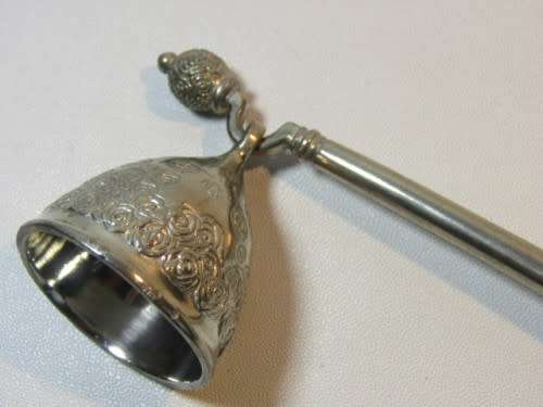 Ornate, heavy candle snuffer. Silver tone metal, fabulous quality. Possibly pewter. 20cm
