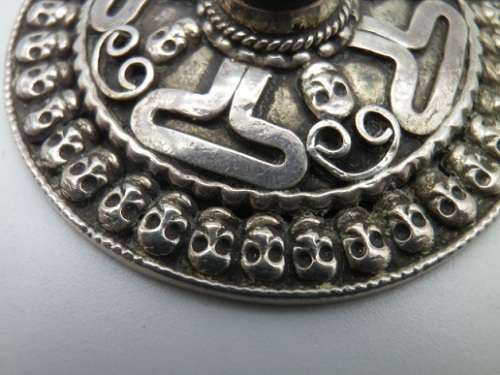 Large Sterling silver designer Skull pendant with central black Tigers Eye.