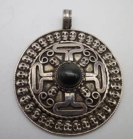 Large Sterling silver designer Skull pendant with central black Tigers Eye.