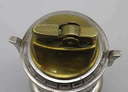Unusual vintage dragon musical table lighter. Plays AULD LANG SYNGE. Chrome plated