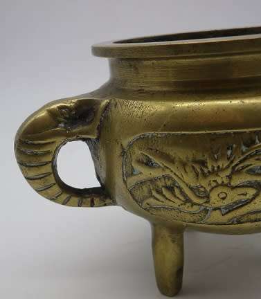 Vintage Chinese solid brass small pot on three legs with dragon motif & elephant handles