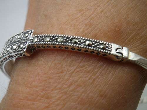 STERLING SILVER & MARCASITE BANGLE. 10.8 grms; 6.3 x 5.4 x 0.7mm. BEAUTIFUL!