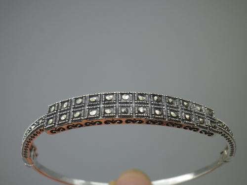 STERLING SILVER & MARCASITE BANGLE. 10.8 grms; 6.3 x 5.4 x 0.7mm. BEAUTIFUL!