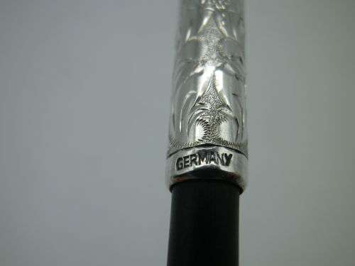Vintage German Sterling Silver Cigarette Holder. Spring loaded to eject used butt 11cm