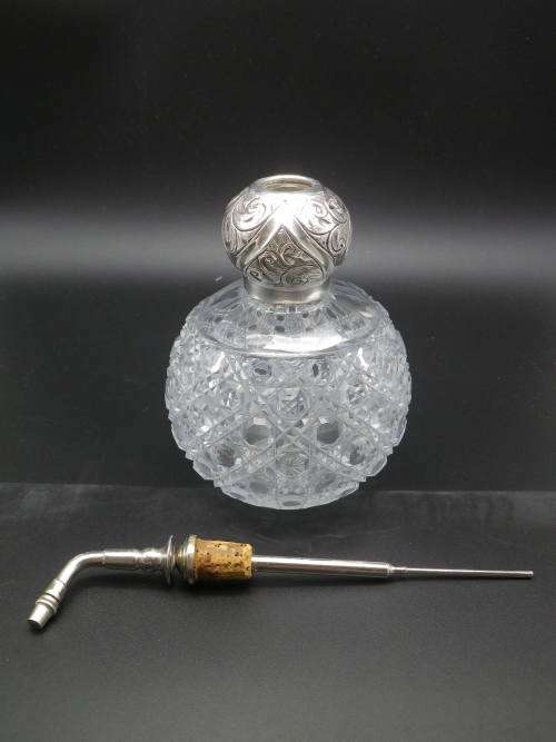 Antique Hallmarked Sterling Silver topped and cut crystal perfume bottle. Birmingham, 1911