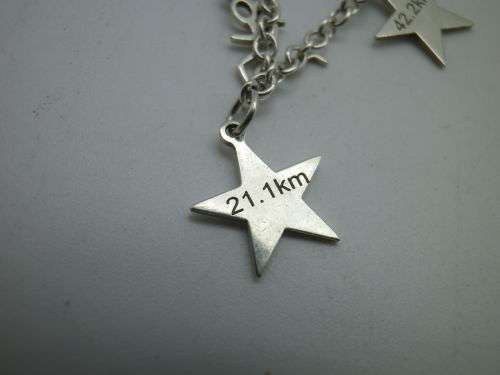 Sterling Silver LADY MARATHON RUNNER Bracelet, with stars for 5, 10, 21 and 42.2km. SPECIAL