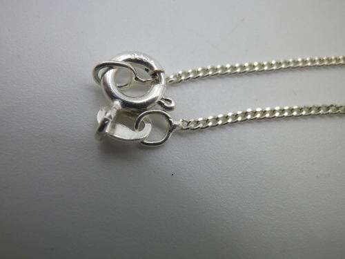 STERLING SILVER and CARNELIAN SUN SHAPED NECKLACE 12.9grms Chain: 60cm pendant: 5.7 x 4.6cm