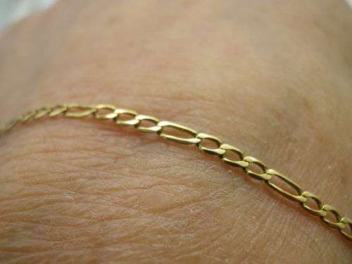 9ct yellow gold fancy link bracelet.  19.5 cm long  Approx 1 grms
