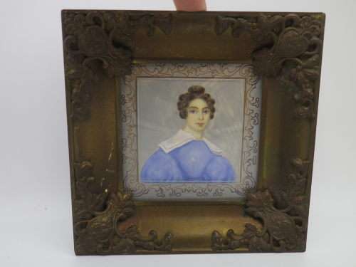 Antique hand-painted miniature portrait behind glass in ornate metal frame. 15cm
