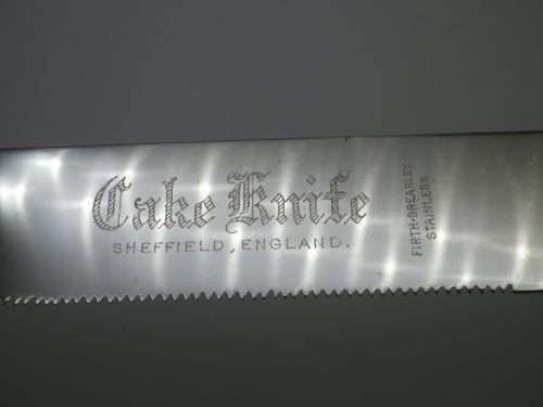 Quality Bone (or faux?) handled Vintage Knives. Sheffield. Includes large bread knife.
