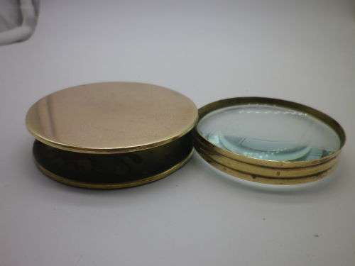 Nice Vintage brass swivel opening table top Magnifying Glass. 7x 1.5cmVery good condition