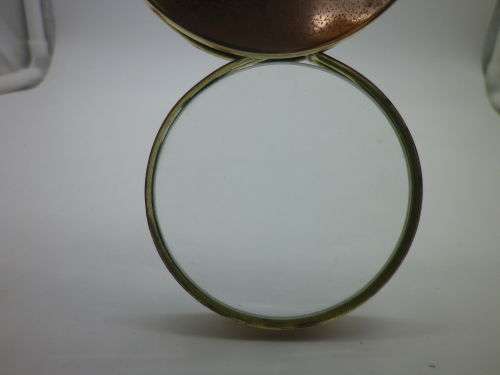 Nice Vintage brass swivel opening table top Magnifying Glass. 7x 1.5cmVery good condition