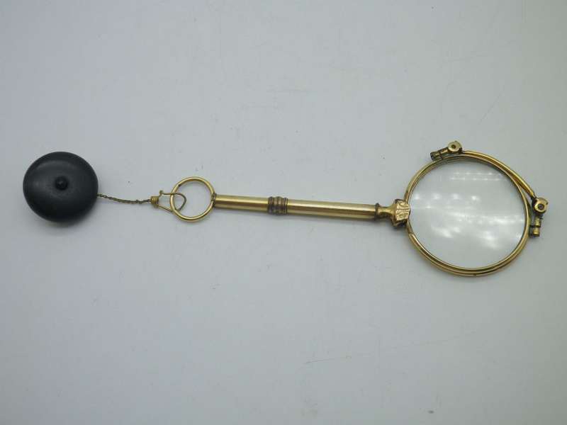 Vintage Gold Plated spring loaded lorgnette with brooch attachment. Made in Germany