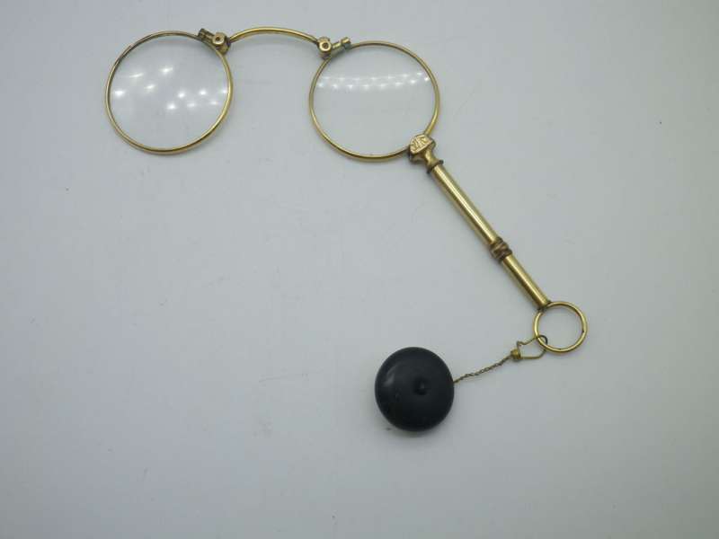 Vintage Gold Plated spring loaded lorgnette with brooch attachment. Made in Germany