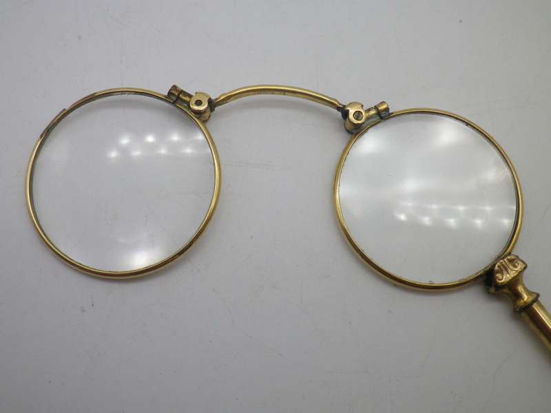Vintage Gold Plated spring loaded lorgnette with brooch attachment. Made in Germany