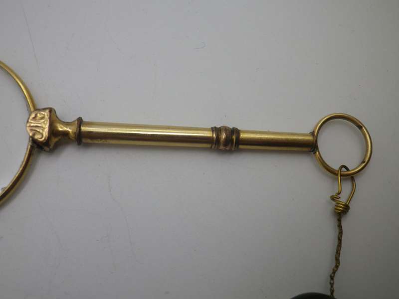 Vintage Gold Plated spring loaded lorgnette with brooch attachment. Made in Germany